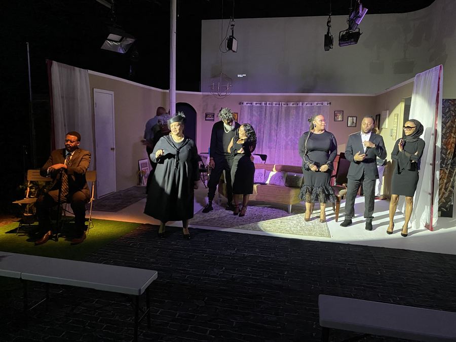 The Family Table — ensemble scene at the family table